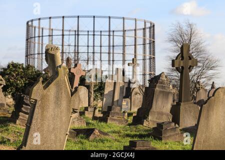 Gravestones and gasometer, Kensal Green Cemetery, Victorian gothic ...