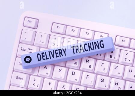 Writing displaying text Delivery Tracking. Business idea the process of localizing shipping containers and mails Typing Engineering Lessons And Stock Photo
