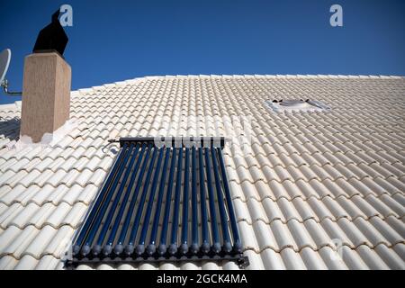 Evacuated Glass Tubes - Solar Water Heater installed in Indian village ...