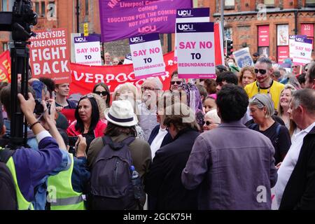 Liverpool, UK. 9th Aug, 2021. Members of the University and College Union (UCU) hold a rally at University Square to defend jobs in Liverpool University health and life sciences that remain under threat, after concerted collective action saved a large proportion of the positions targeted for redundancy by the university's administration. UCU has been involved in industrial action for months, after an overwhelming vote among UCU members across the university in favour of strike action, to defend 47 staff. Credit: ken biggs/Alamy Live News Stock Photo