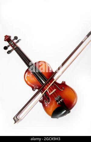 Front view of violin with Violin stick isolated on white background Stock Photo