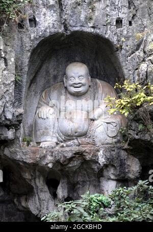 Lingyin Temple in Hangzhou, China. Buddha carving at Feilai Feng a limestone peak near to the front of the temple. Stock Photo