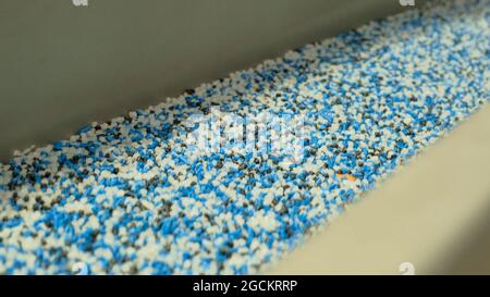 Close-up shot of equipment for sorting and mixing bulk materials at the enterprise. Stock Photo
