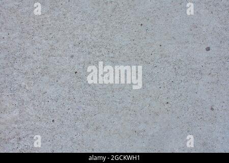 Gray surface with dots view from above Stock Photo