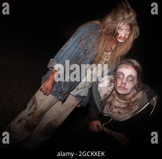 Alton Towers Dark Apocalypse and Freak Show Scare Actors during Halloween Scarefest Event Stock Photo