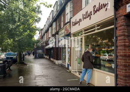 London August 2021: Pitshanger Lane shops, a busy high street of independent shops in Ealing, West London Stock Photo