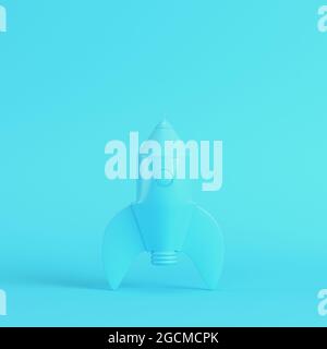 Cartoon styled rocket on bright blue background in pastel colors. Minimalism concept. 3d render Stock Photo