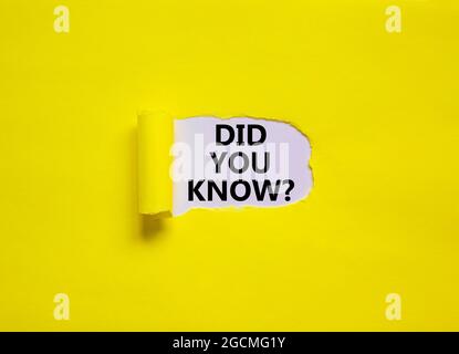 Did you know symbol. Words 'Did you know' appearing behind torn yellow paper. Beautiful yellow background. Business, did you know concept, copy space. Stock Photo