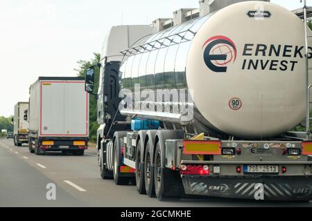 Tank truck and lorry trucks driving on the road, July 2021, Zagreb, Croatia Stock Photo