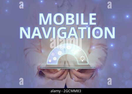Text sign showing Mobile Navigation. Business concept graphical user interface used to aid the vehicle driver Lady In Uniform Holding Pen Phone Stock Photo