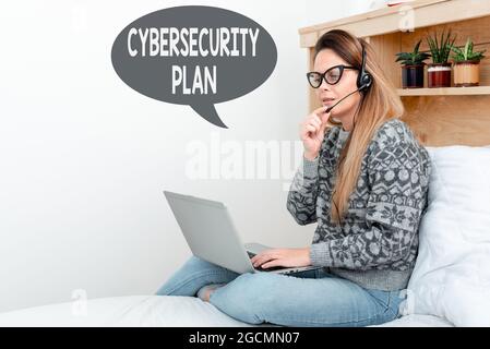 Sign displaying Cybersecurity Plan. Conceptual photo Techniques of protecting computer and system from attacks Student Learning New Things Online Stock Photo