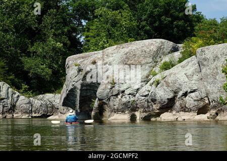 rock formations, sculpted by water, man in kayak, recreation, sport, trees, vegetation, nature, Susquehanna River, Water Trail,  Conowingo Reservoir, Stock Photo