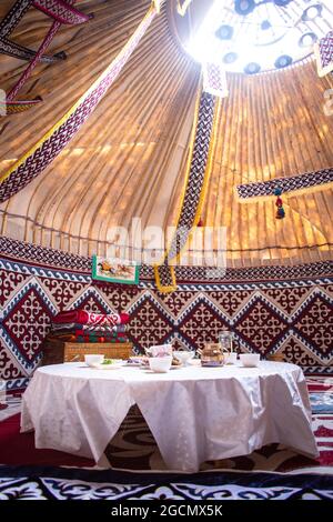 table on the floor. the national Kazakh yurt Stock Photo