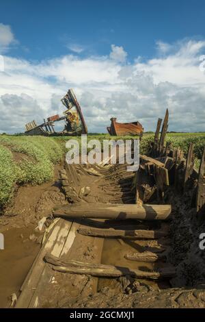 Abandoned fishing boat left to rot and decay on the beach at Dungeness ...