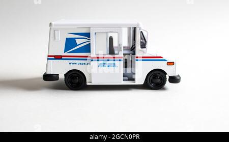 USPS, United States Postal Service car with the door sliding open Stock Photo