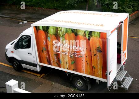 London, UK. 09th Aug, 2021. A Sainsbury's delivery van seen on the street in London. Credit: SOPA Images Limited/Alamy Live News Stock Photo