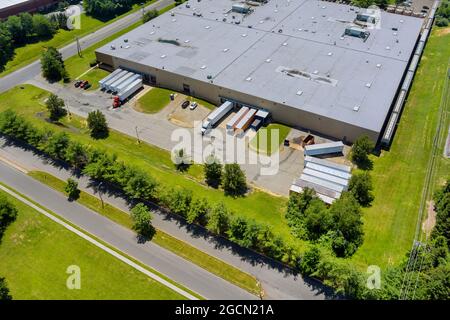 Logistic transportation cargo terminal of large modern industrial warehouse buildings with aerial view Stock Photo