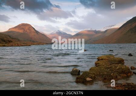 The Wasdale Fells from the shores of Wast Water at sunset, Lake District, Cumbria, UK Stock Photo