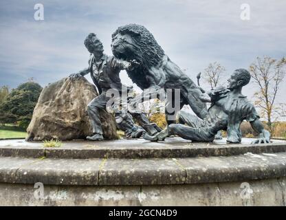 Statue of a lion attacking David Livingstone a  sculpture by Gareth Knowles funded by Ray Harryhausen, whose idea it was. It was unveiled in Blantyre, Stock Photo