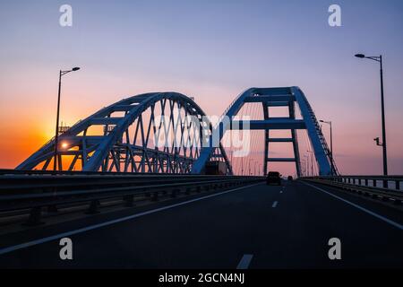 Crimea bridge over Kerch Strait at the evening sunset. Stock Photo