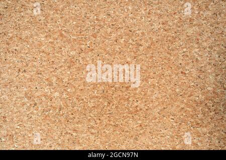 blank natural colored corkboard abstract background texture, simple beige Stock Photo