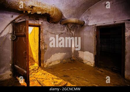 Old abandoned dirty Soviet bunker, echo of Cold War. Stock Photo