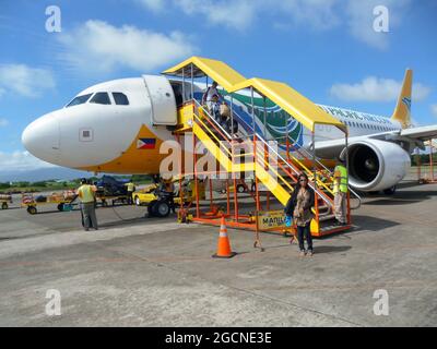 Airbus A320 is parking a the apron at the international airport in Manila on the Philippines 14.12.2012