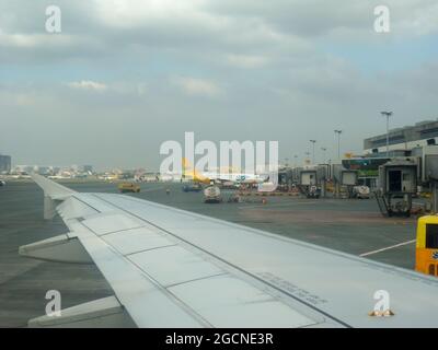 View to the apron from an Airbus A320 of the international airport in Manila on the Philippines 14.12.2012