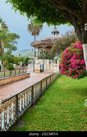 UNION DE TULA, MEXICO - Jun 23, 2021: Main garden plaza of Union de Tula, Jalisco, with a kiosk in the center and a church in the background Stock Photo