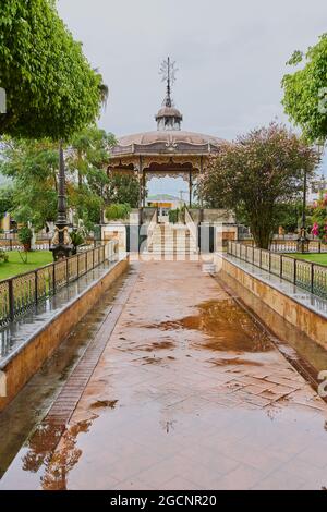 UNION DE TULA, MEXICO - Jun 23, 2021: Main garden plaza of Union de Tula, Jalisco, with a kiosk in the center and a church in the background Stock Photo