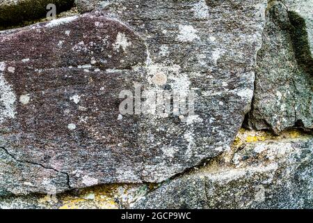 Detail of the granite wall of the entrance building of The Blowing Rock, a tourist attraction in the Blue Ridge Mountains of North Carolina. Stock Photo