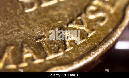 macro close up of 50 Malaysian ringgit cent. The bank negara fifty cent coin of Malaysia. Sharp detailed capture of the Malaysia character on the RM 5 Stock Photo