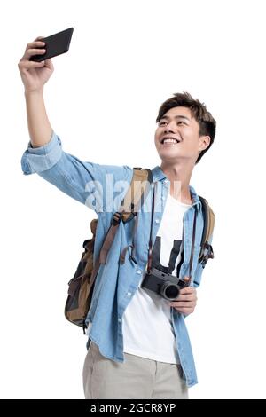Young university student taking selfie with smartphone Stock Photo