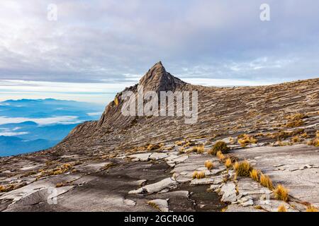 At the peak of Mount Kinabalu, Sabah, Borneo, Malaysia. The Mt Kinabalu is  with 4095 meter above sea level, the highest mountain in south east Asia, Stock Photo
