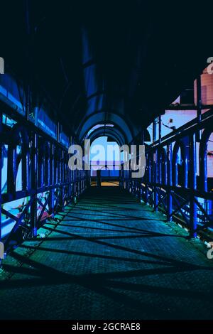 A pedestrian bridge made of iron Stock Photo