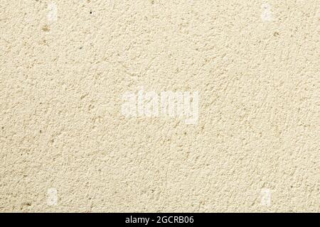 texture of a rough wall with light yellow concrete pores building material concept material construction Stock Photo