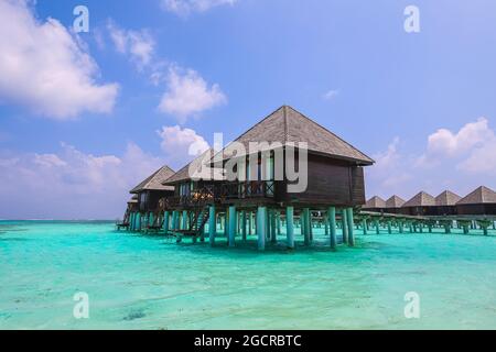 Water bungalows at the floated resort at the Maldives, small island nation in South Asia, located in the Arabian Sea.  Olhuveli Beach Spa Resort Gurai Stock Photo