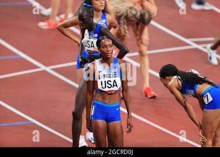 Dalilah MUHAMMAD (USA) and Team USA recover after their Gold Medal finish in the Final of the Women's 4 x 400m Relay as Allyson Felix wins her record 11th Olympic medal AUGUST 7, 2021 - Athletics : Women's 4 x 400m Relay Final during the Tokyo 2020 Olympic Games at the National Stadium in Tokyo, Japan. Credit: AFLO SPORT/Alamy Live News Stock Photo