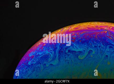 Incredible patterns formed on the surface of an ordinary soap bubble photographed in extreme close up Stock Photo