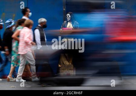 Non Exclusive: MEXICO CITY, MEXICO - AUGUST 8: A person disguised as a skull  during the third wave of Covid-19 infections, despite Mexico City It is Stock Photo