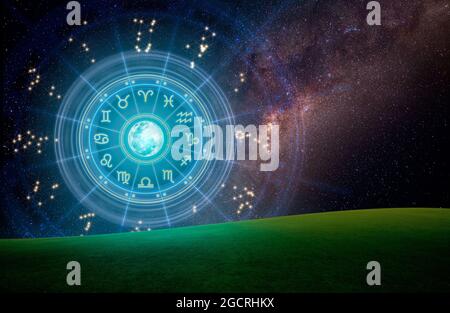 Astrological zodiac signs inside of horoscope circle. Astrology, knowledge of stars in the sky over the milky way and moon. Stock Photo