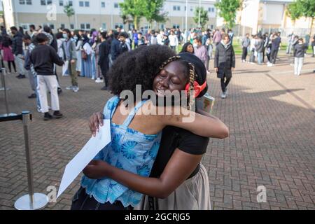 Students celebrate at Brampton Manor Academy in London, as they receive their A-Level results. Picture date: Tuesday August 10, 2021.