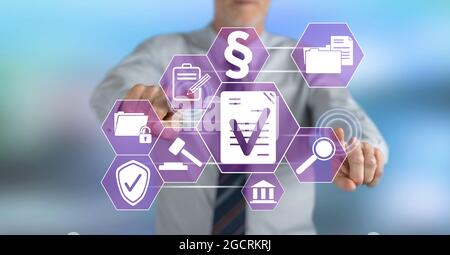 Man touching a validation concept on a touch screen with his fingers Stock Photo