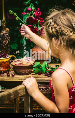 Dumplings with cherries. Traditional culture. Stock Photo