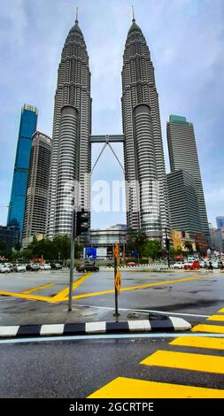 KUALA LUMPUR, MALAYSIA - Jan 29, 2020: The scenic Petronas Twin Towers, a twin building complex in Kuala Lumpur, Malaysia Stock Photo