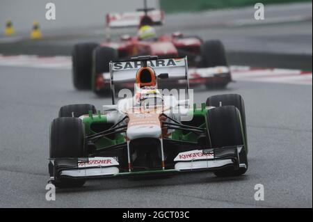 Jules Bianchi (FRA) Sahara Force India F1 Team VJM06 leads Felipe Massa (BRA) Ferrari F138. Formula One Testing, Day Four, Friday 22nd February 2013. Barcelona, Spain. Stock Photo