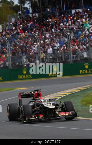 Race winner Kimi Raikkonen (FIN) Lotus F1 Team celebrates on the 