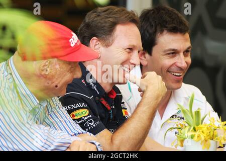 (L to R): Niki Lauda (AUT) Mercedes Non-Executive Chairman with Christian Horner (GBR) Red Bull Racing Team Principal and Toto Wolff (GER) Mercedes AMG F1 Shareholder and Executive Director. Bahrain Grand Prix, Sunday 23rd April 2013. Sakhir, Bahrain. Stock Photo
