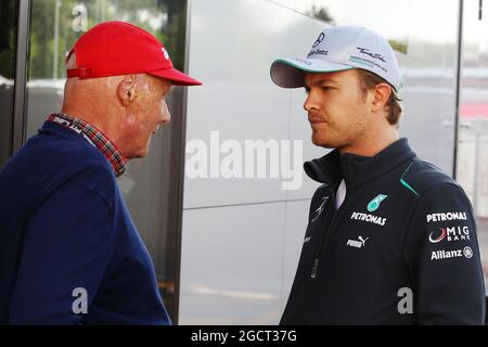 (L to R): Niki Lauda (AUT) Mercedes Non-Executive Chairman with Nico Rosberg (GER) Mercedes AMG F1 W04. Spanish Grand Prix, Saturday 11th May 2013. Barcelona, Spain. Stock Photo