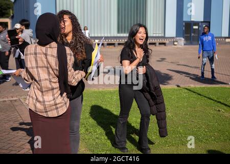 Students celebrate at Brampton Manor Academy in London, as they receive their A-Level results. Picture date: Tuesday August 10, 2021.